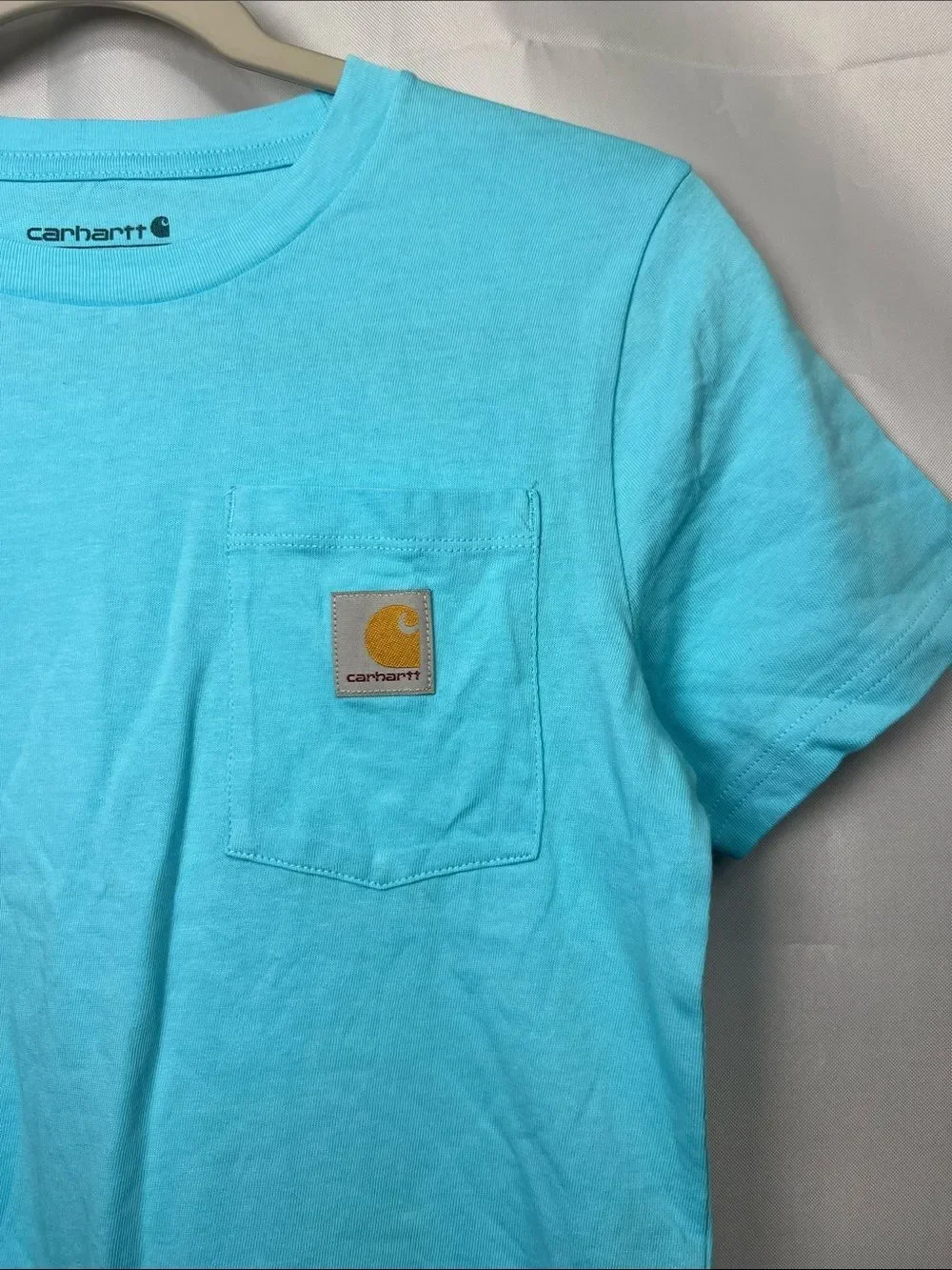 Carhartt blue pocket t-shirt with camping graphic on back
